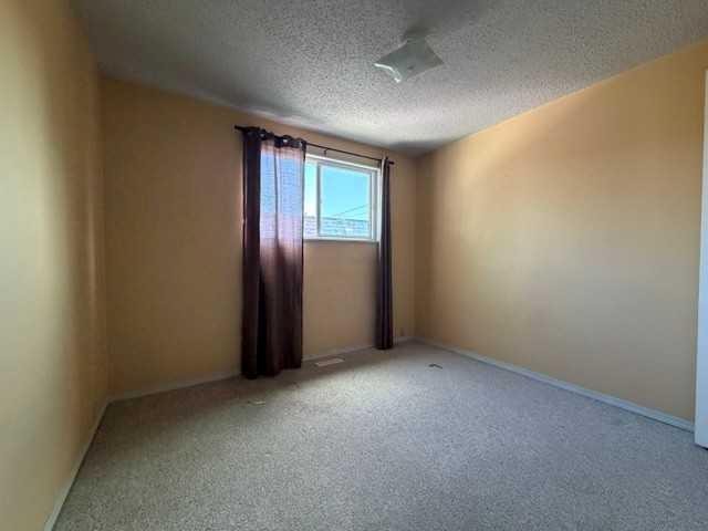 3915 29A Avenue Se, Calgary, AB - Indoor Photo Showing Other Room