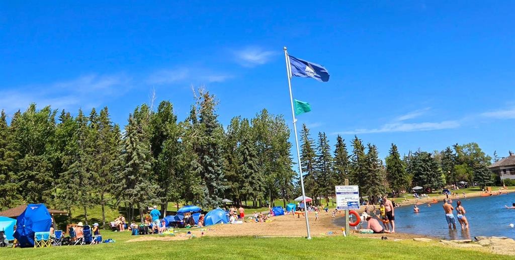 76 Sunlake Gardens Se, Calgary, AB - Outdoor With Body Of Water