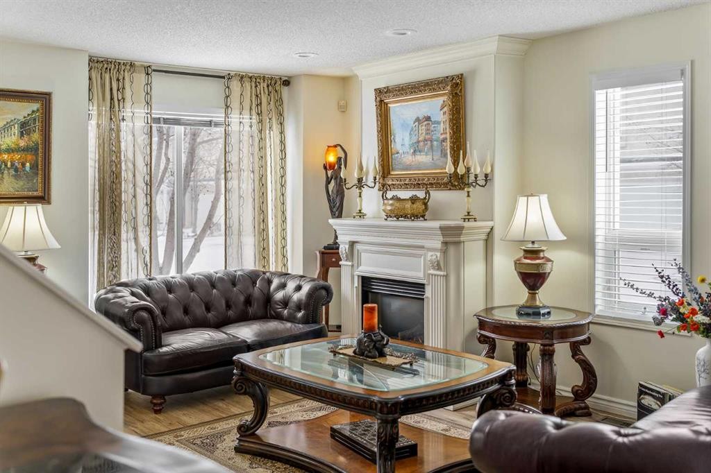 76 Sunlake Gardens Se, Calgary, AB - Indoor Photo Showing Living Room With Fireplace