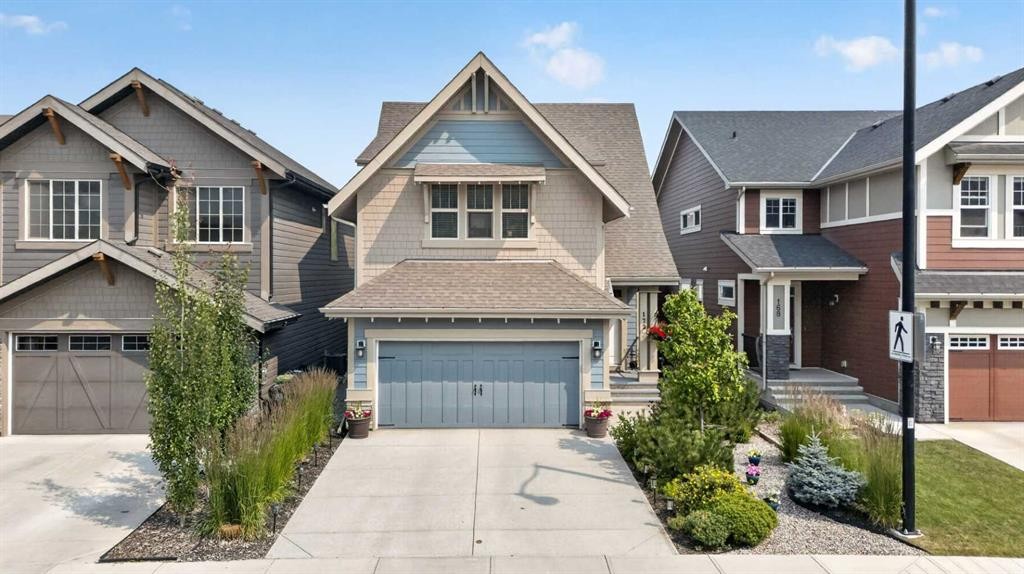 172 Riviera Way, Cochrane, AB - Outdoor With Facade