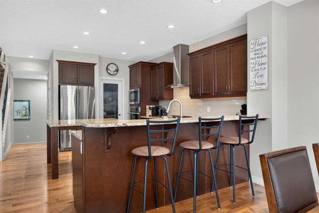172 Riviera Way, Cochrane, AB - Indoor Photo Showing Kitchen With Upgraded Kitchen