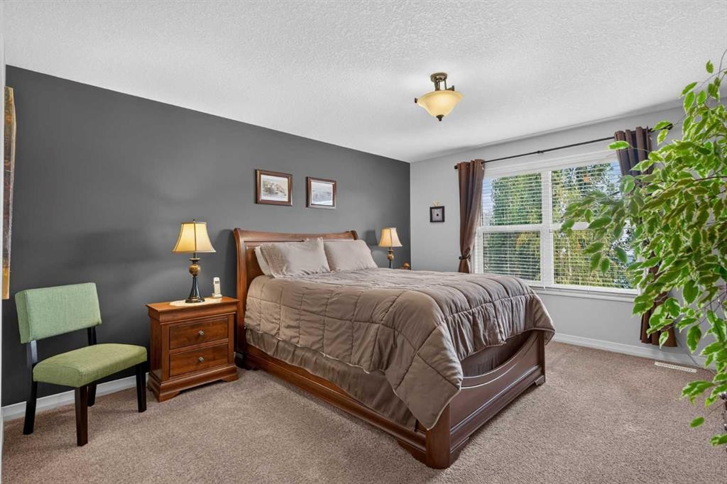 172 Riviera Way, Cochrane, AB - Indoor Photo Showing Bedroom