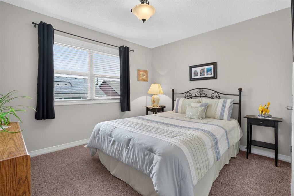 172 Riviera Way, Cochrane, AB - Indoor Photo Showing Bedroom
