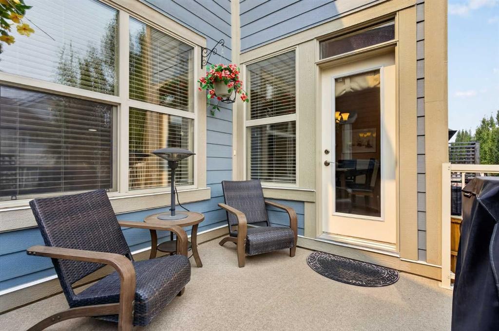 172 Riviera Way, Cochrane, AB - Outdoor With Deck Patio Veranda With Exterior