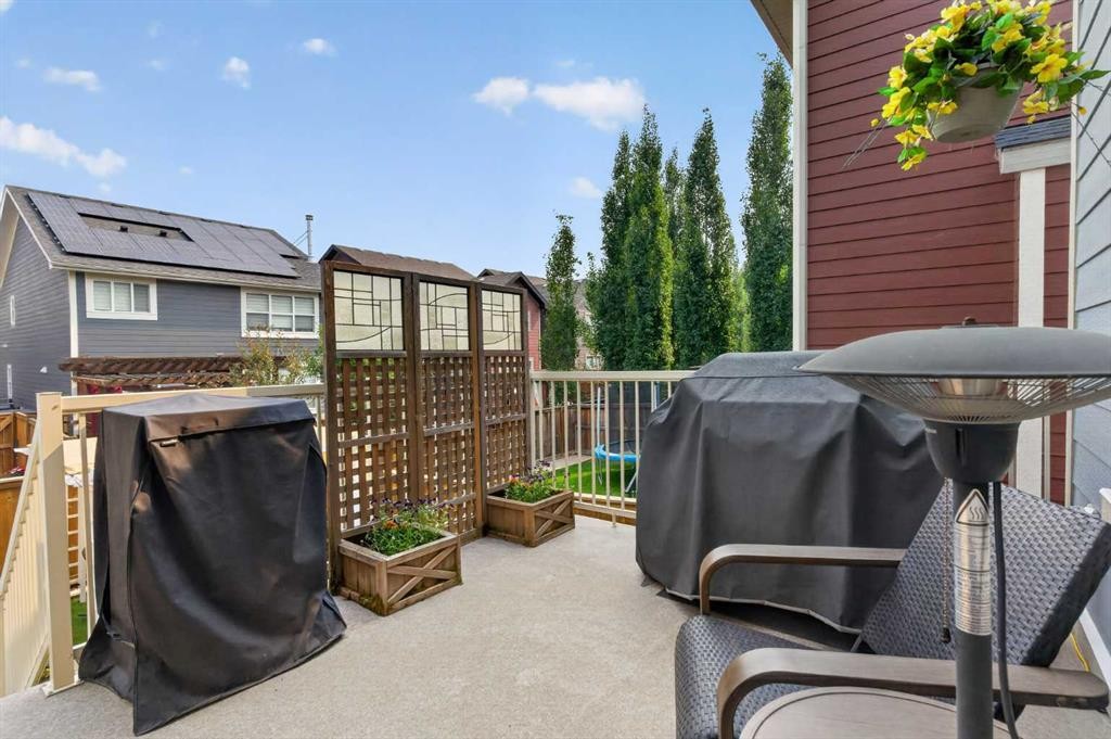 172 Riviera Way, Cochrane, AB - Outdoor With Deck Patio Veranda With Exterior