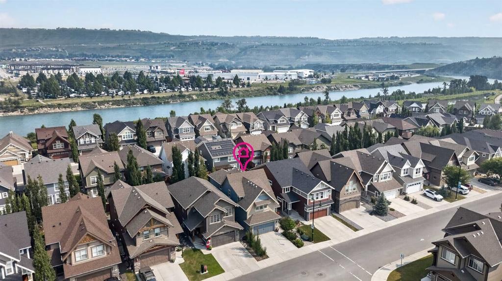 172 Riviera Way, Cochrane, AB - Outdoor With Body Of Water With View