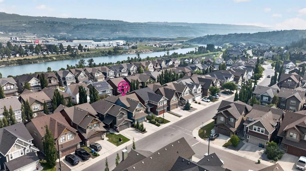 172 Riviera Way, Cochrane, AB - Outdoor With Body Of Water With View