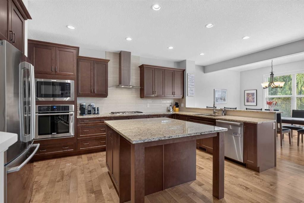172 Riviera Way, Cochrane, AB - Indoor Photo Showing Kitchen With Upgraded Kitchen
