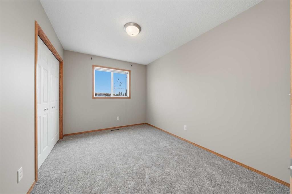 142 Arbour Meadows Close Nw, Calgary, AB - Indoor Photo Showing Other Room