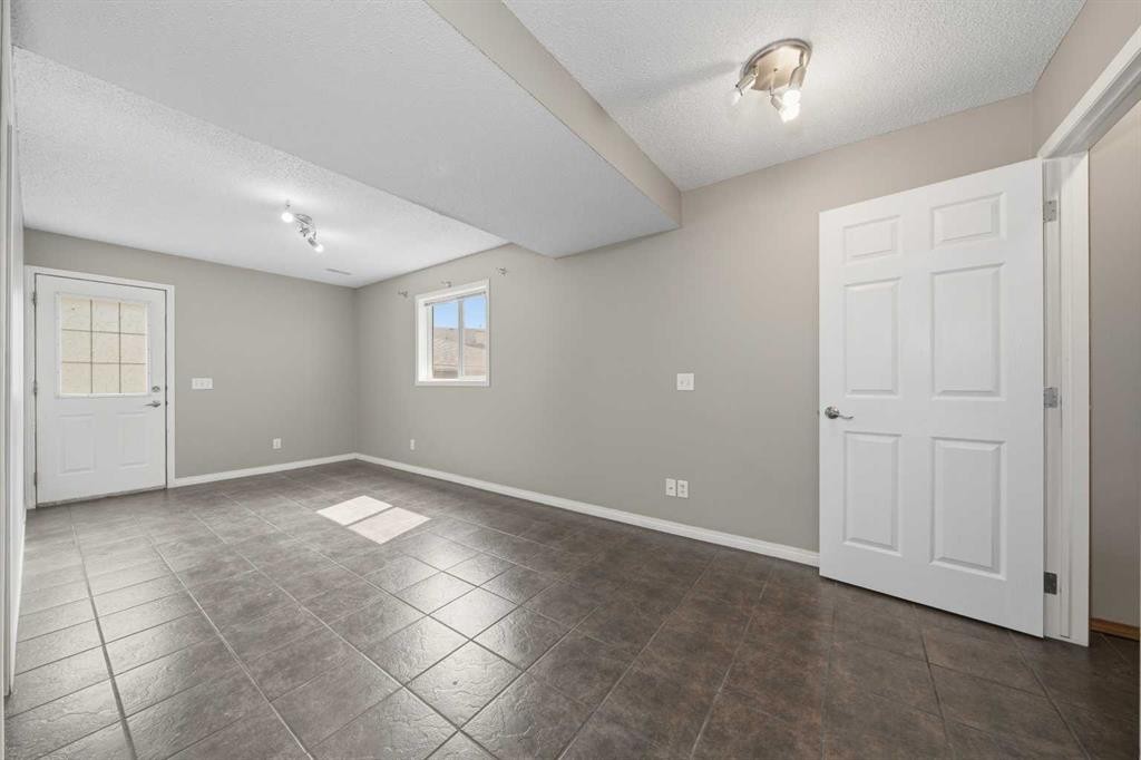 142 Arbour Meadows Close Nw, Calgary, AB - Indoor Photo Showing Other Room