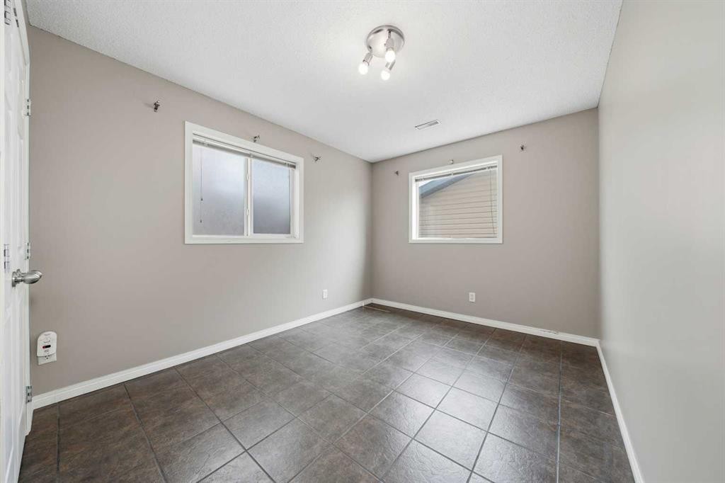 142 Arbour Meadows Close Nw, Calgary, AB - Indoor Photo Showing Other Room