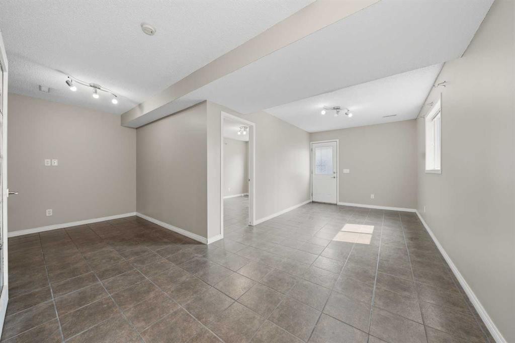 142 Arbour Meadows Close Nw, Calgary, AB - Indoor Photo Showing Other Room