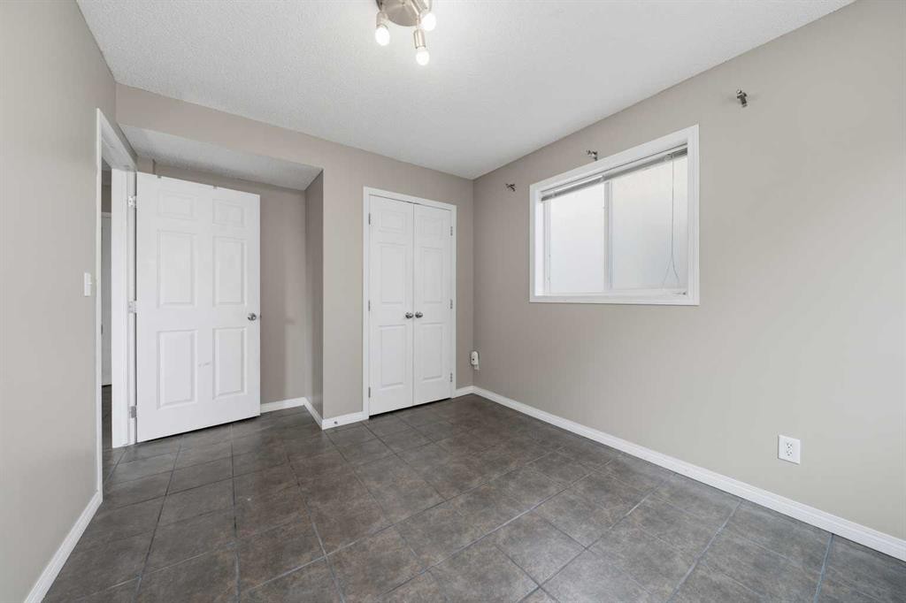 142 Arbour Meadows Close Nw, Calgary, AB - Indoor Photo Showing Other Room