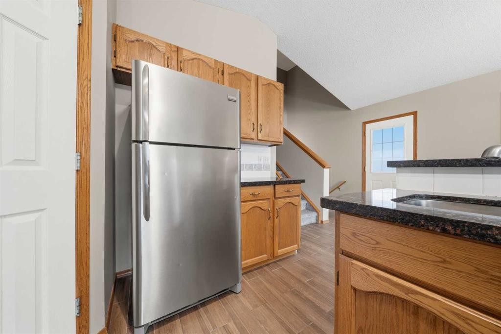 142 Arbour Meadows Close Nw, Calgary, AB - Indoor Photo Showing Kitchen