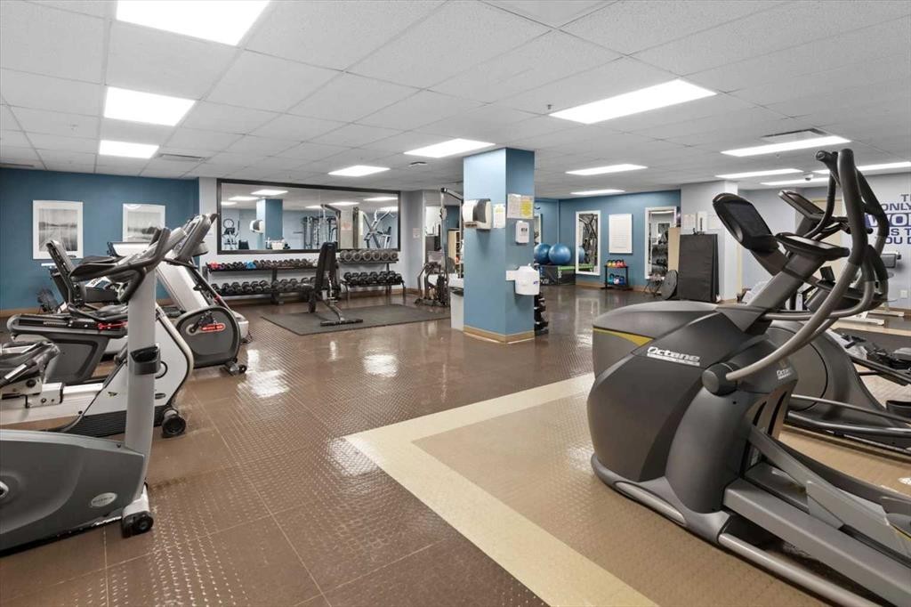 131-369 Rocky Vista Park Nw, Calgary, AB - Indoor Photo Showing Gym Room
