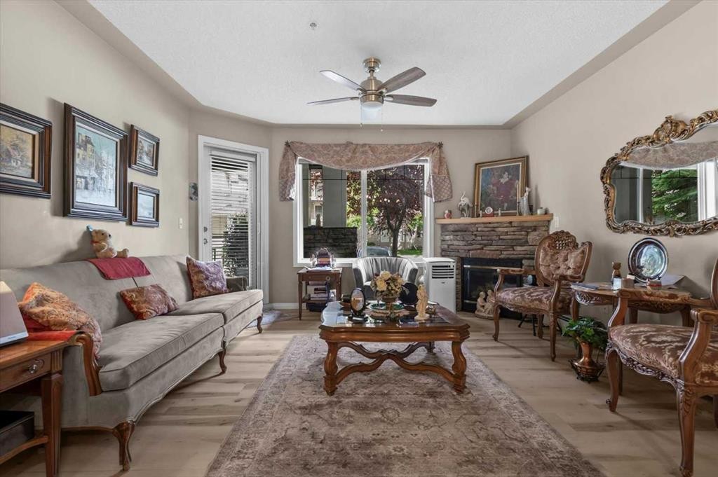 131-369 Rocky Vista Park Nw, Calgary, AB - Indoor Photo Showing Living Room With Fireplace