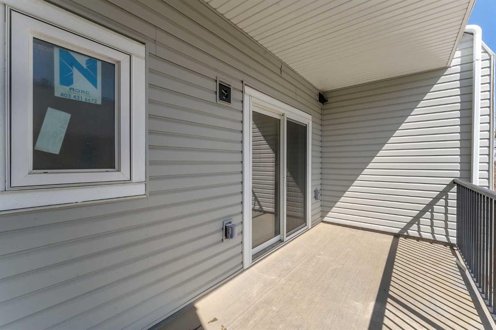 203-8850 48 Street Ne, Calgary, AB - Outdoor With Deck Patio Veranda With Exterior