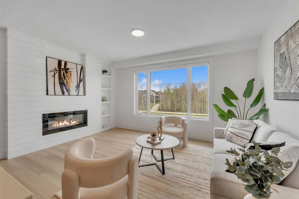 203-8850 48 Street Ne, Calgary, AB - Indoor Photo Showing Living Room With Fireplace