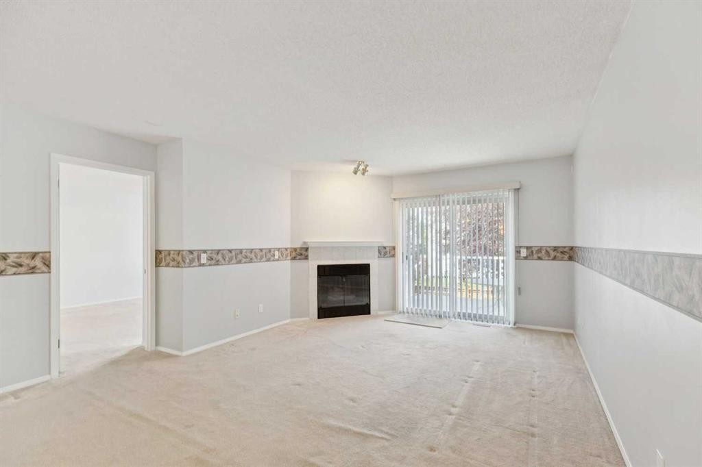 134 Hawkstone Manor Nw, Calgary, AB - Indoor With Fireplace