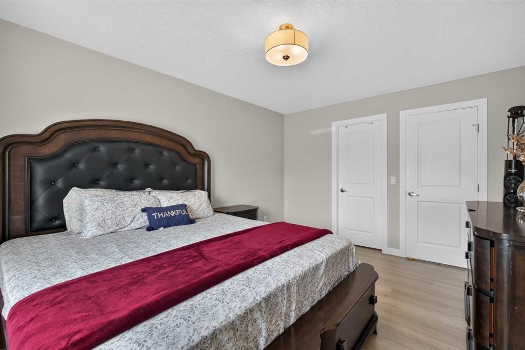 45 Saddlestone Drive Ne, Calgary, AB - Indoor Photo Showing Bedroom