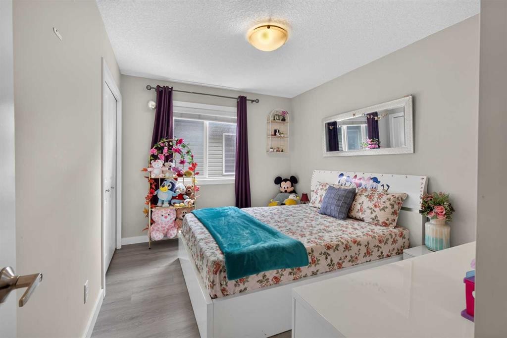 45 Saddlestone Drive Ne, Calgary, AB - Indoor Photo Showing Bedroom