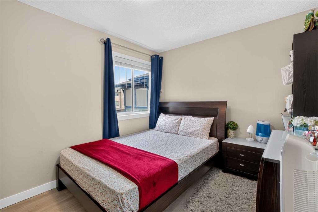 45 Saddlestone Drive Ne, Calgary, AB - Indoor Photo Showing Bedroom