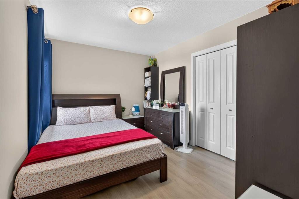 45 Saddlestone Drive Ne, Calgary, AB - Indoor Photo Showing Bedroom