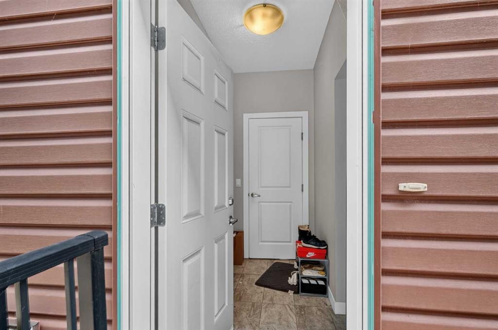 45 Saddlestone Drive Ne, Calgary, AB - Indoor Photo Showing Other Room