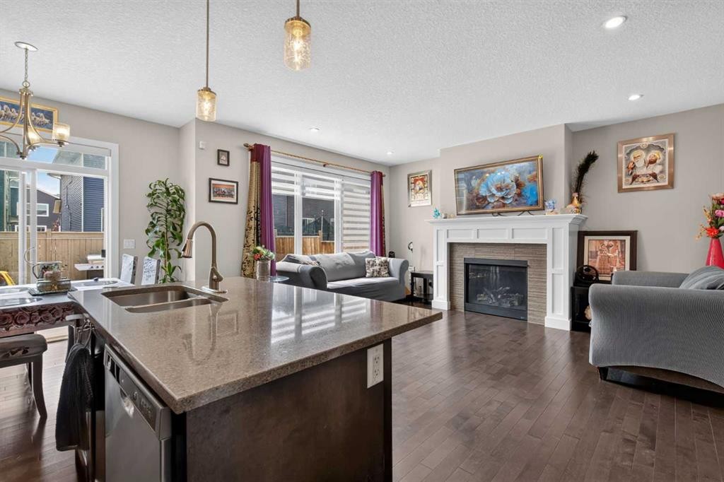 45 Saddlestone Drive Ne, Calgary, AB - Indoor With Fireplace