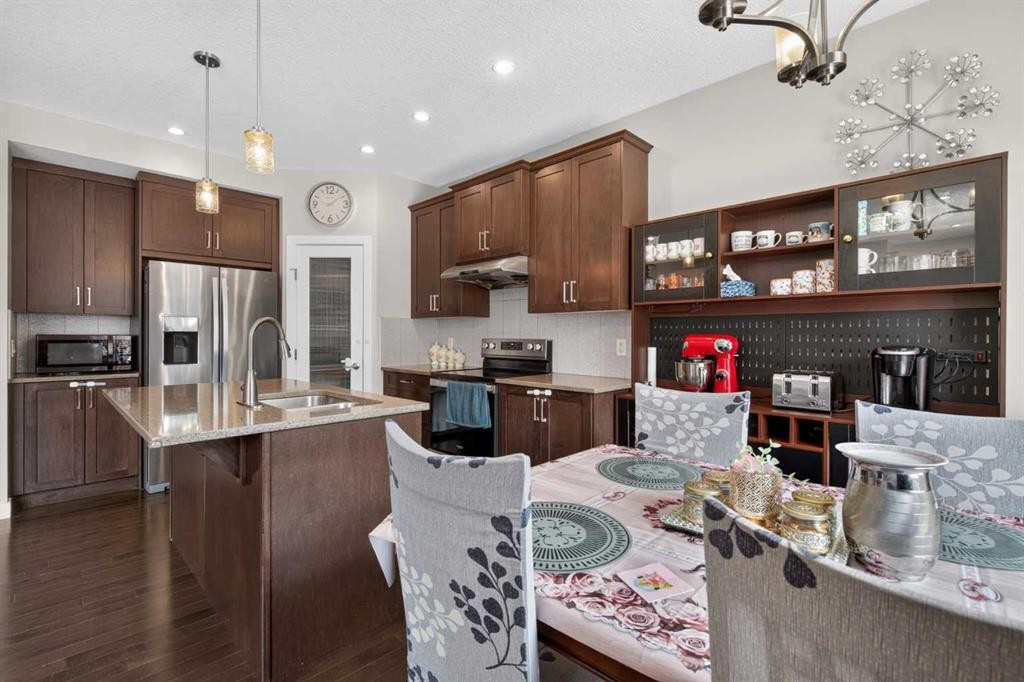 45 Saddlestone Drive Ne, Calgary, AB - Indoor Photo Showing Kitchen With Stainless Steel Kitchen With Double Sink With Upgraded Kitchen