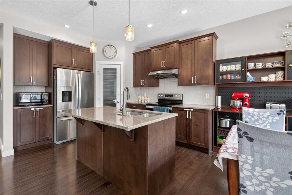 45 Saddlestone Drive Ne, Calgary, AB - Indoor Photo Showing Kitchen With Stainless Steel Kitchen With Double Sink With Upgraded Kitchen