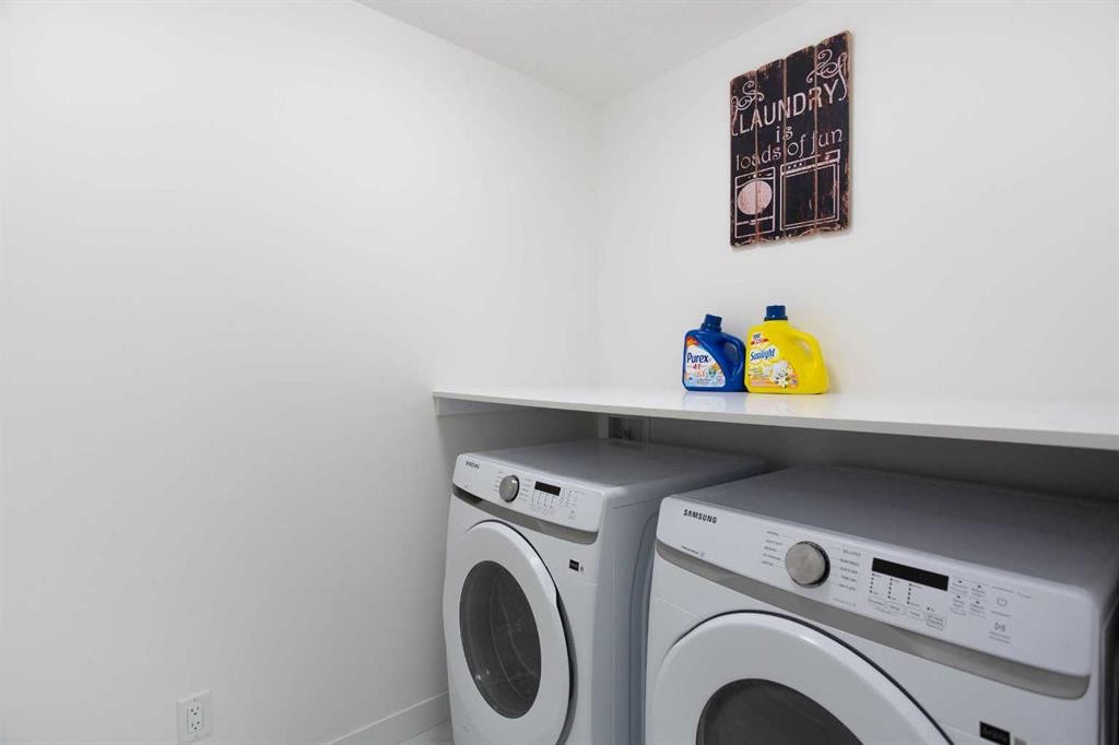 91 Copperhead Grove Se, Calgary, AB - Indoor Photo Showing Laundry Room