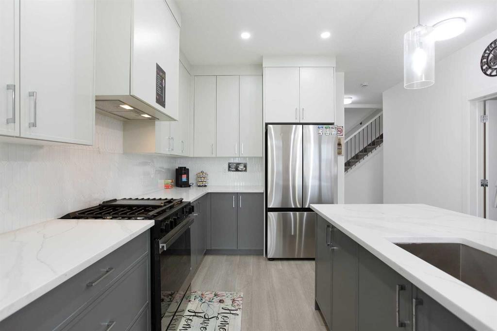 91 Copperhead Grove Se, Calgary, AB - Indoor Photo Showing Kitchen With Upgraded Kitchen
