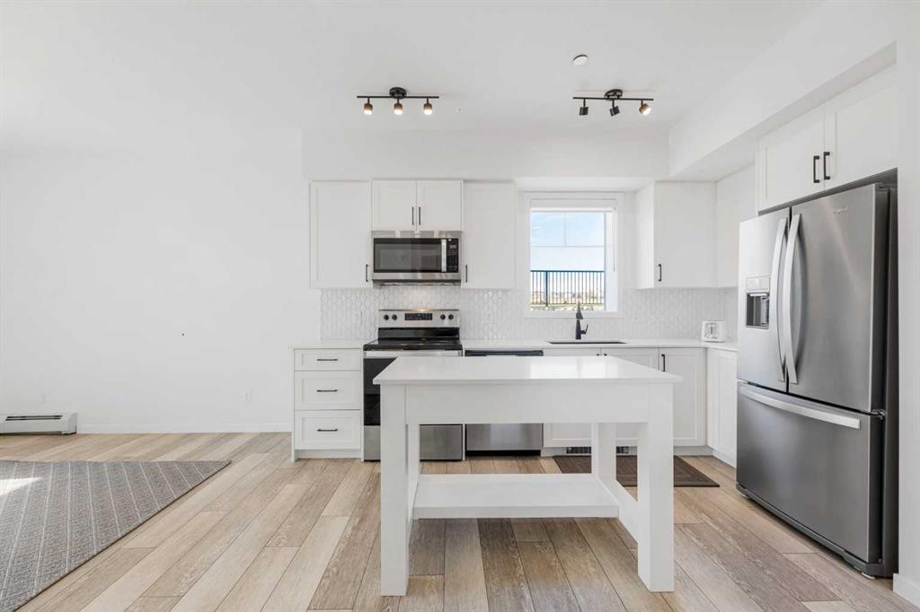 3104-3727 Sage Hill Drive Nw, Calgary, AB - Indoor Photo Showing Kitchen With Stainless Steel Kitchen With Upgraded Kitchen