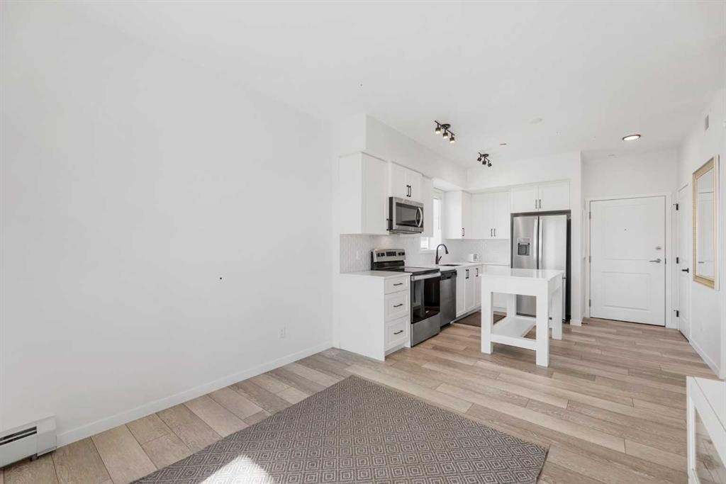 3104-3727 Sage Hill Drive Nw, Calgary, AB - Indoor Photo Showing Kitchen With Stainless Steel Kitchen With Upgraded Kitchen