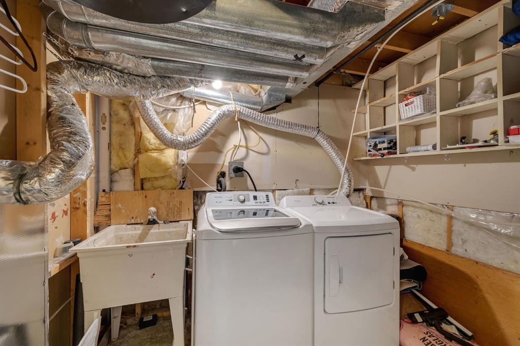 44 Strathclair Rise Sw, Calgary, AB - Indoor Photo Showing Laundry Room