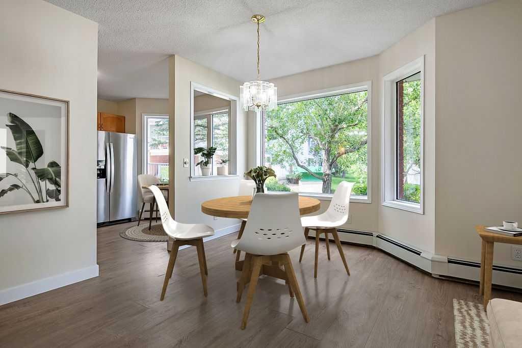 1103-1103 Hawksbrow Point Nw, Calgary, AB - Indoor Photo Showing Dining Room