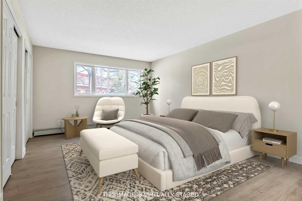 1103-1103 Hawksbrow Point Nw, Calgary, AB - Indoor Photo Showing Bedroom