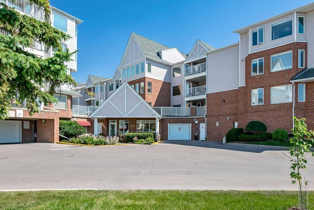 1103-1103 Hawksbrow Point Nw, Calgary, AB - Outdoor With Facade