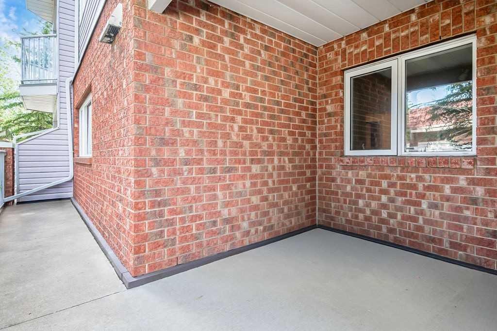 1103-1103 Hawksbrow Point Nw, Calgary, AB - Outdoor With Exterior