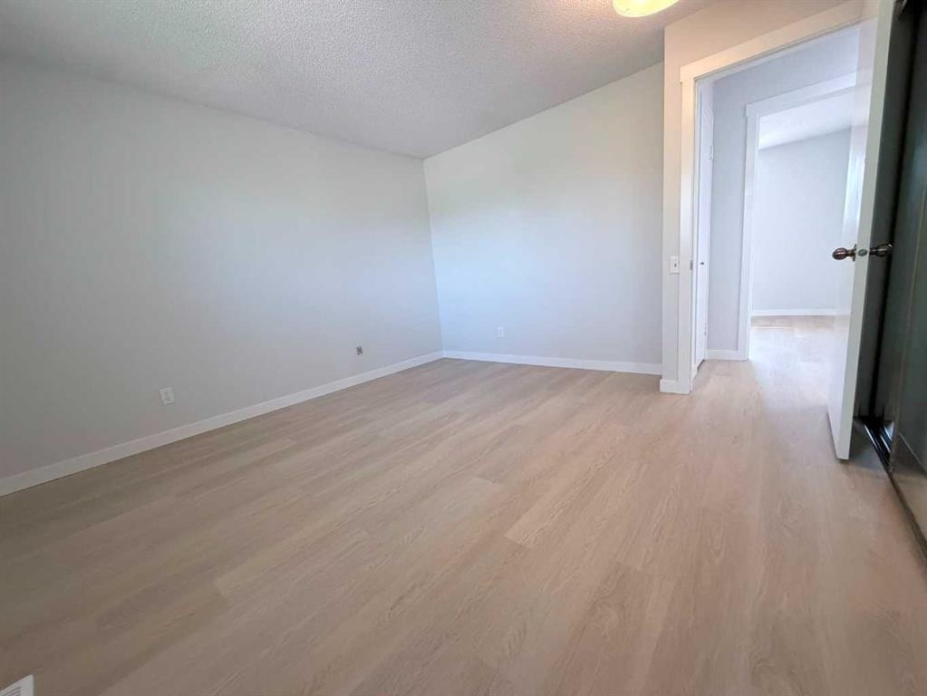 215 Penbrooke Way Se, Calgary, AB - Indoor Photo Showing Other Room