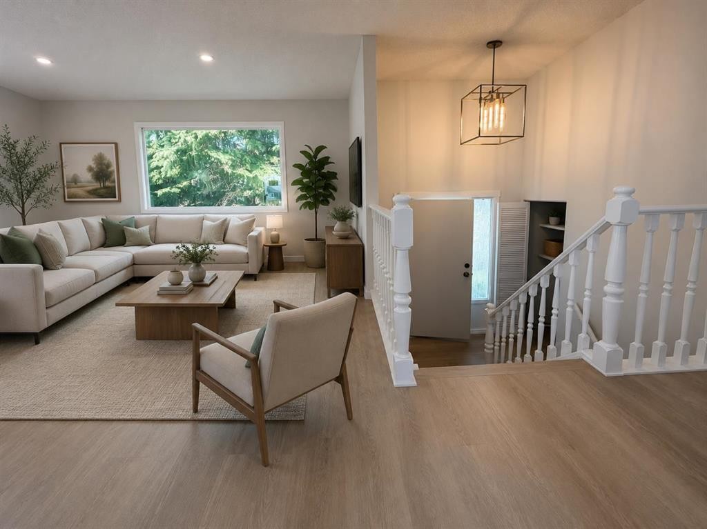 215 Penbrooke Way Se, Calgary, AB - Indoor Photo Showing Living Room