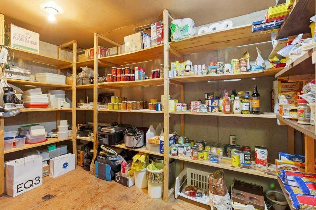 9511 Academy Drive Se, Calgary, AB - Indoor With Storage