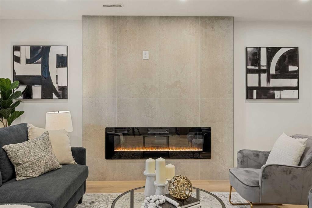 156 Strathridge Place Sw, Calgary, AB - Indoor Photo Showing Living Room With Fireplace