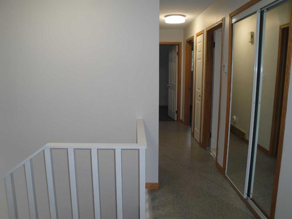31 Huntford Road Ne, Calgary, AB - Indoor Photo Showing Other Room