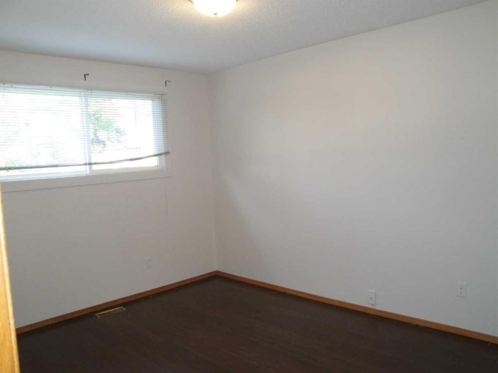 31 Huntford Road Ne, Calgary, AB - Indoor Photo Showing Other Room