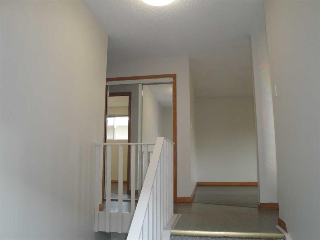 31 Huntford Road Ne, Calgary, AB - Indoor Photo Showing Other Room