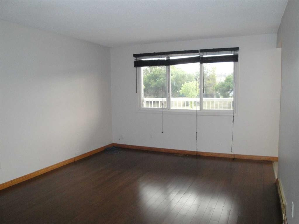 31 Huntford Road Ne, Calgary, AB - Indoor Photo Showing Other Room
