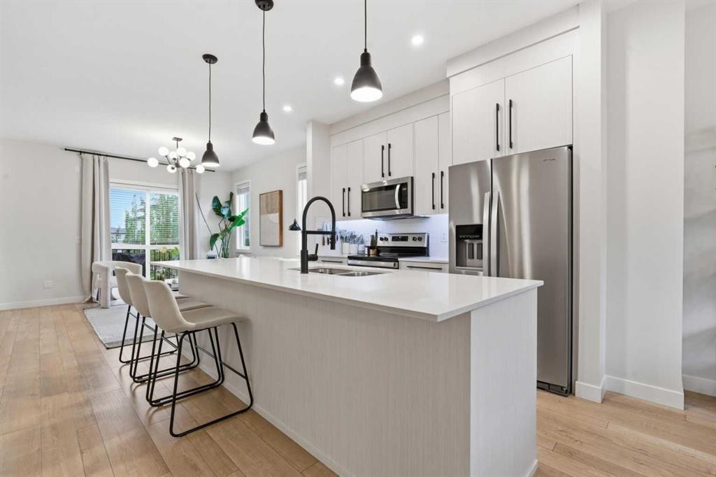 322-72 Cornerstone Manor Ne, Calgary, AB - Indoor Photo Showing Kitchen With Double Sink With Upgraded Kitchen