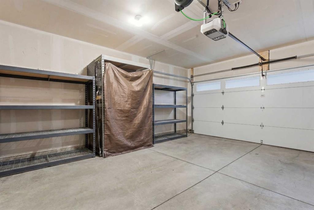 322-72 Cornerstone Manor Ne, Calgary, AB - Indoor Photo Showing Garage